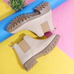 Load image into Gallery viewer, Block Heeled Chelsea Boots in cream leather with chunky sole, photographed on colorful pastel background with decorative plant